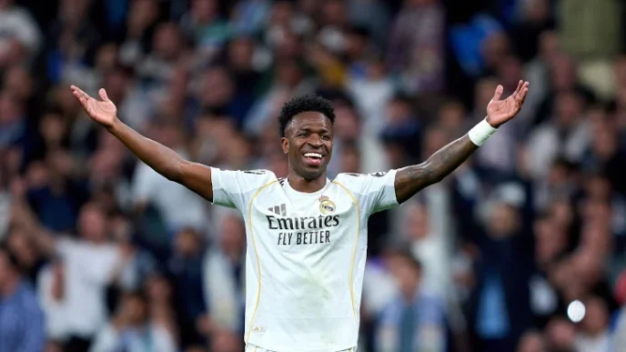 Vinícius Júnior celebrating his match-winning goal against Benfica at the Santiago Bernabéu, February 2026.
