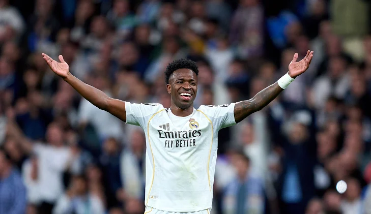 Vinícius Júnior celebrating his match-winning goal against Benfica at the Santiago Bernabéu, February 2026.