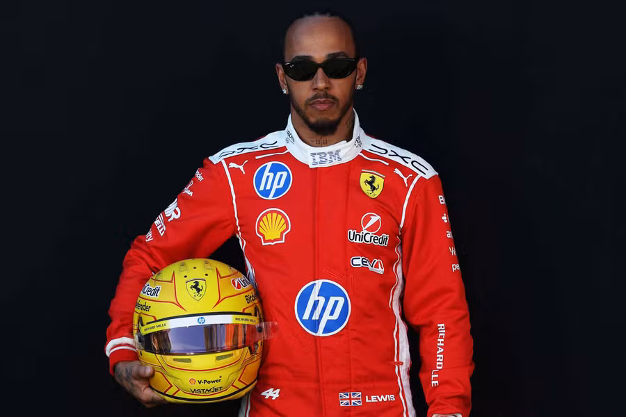Lewis Hamilton in his 2026 Ferrari race suit during the Melbourne opening ceremony.