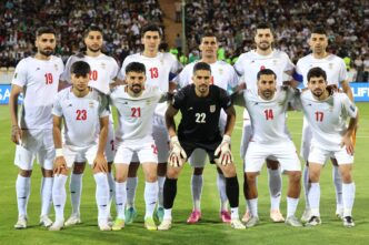 The Iranian national football team lineup during a qualifying match for the 2026 World Cup.