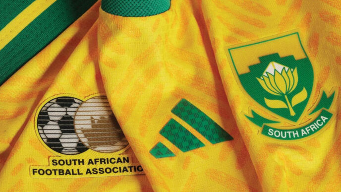 The new 2026/27 yellow and green South Africa home jersey featuring the 12-language woven pattern