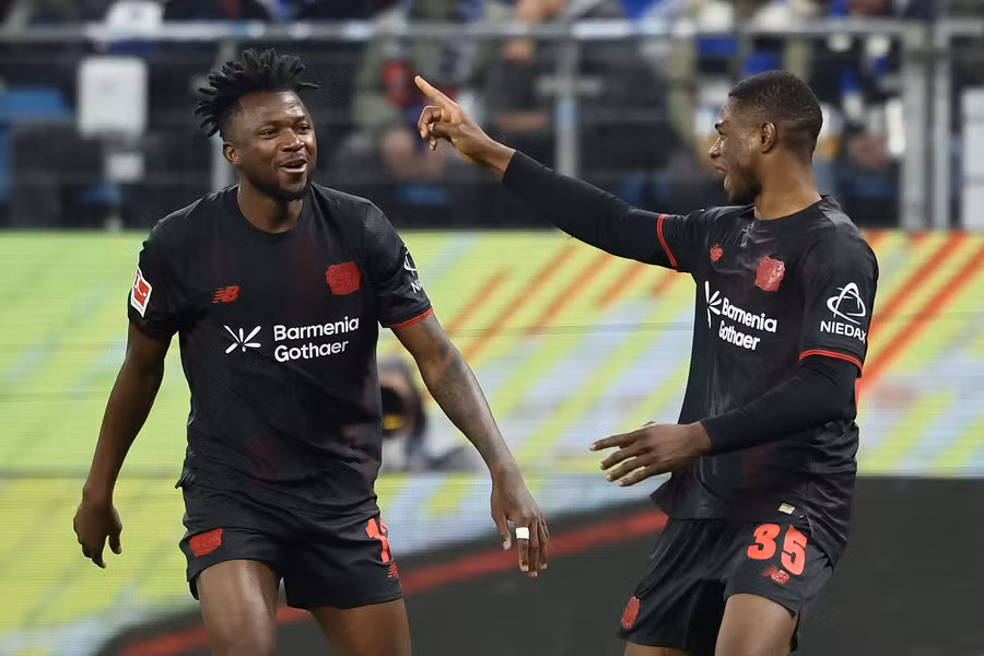 Christian Kofane celebrating his winning goal for Bayer Leverkusen against Hamburg.