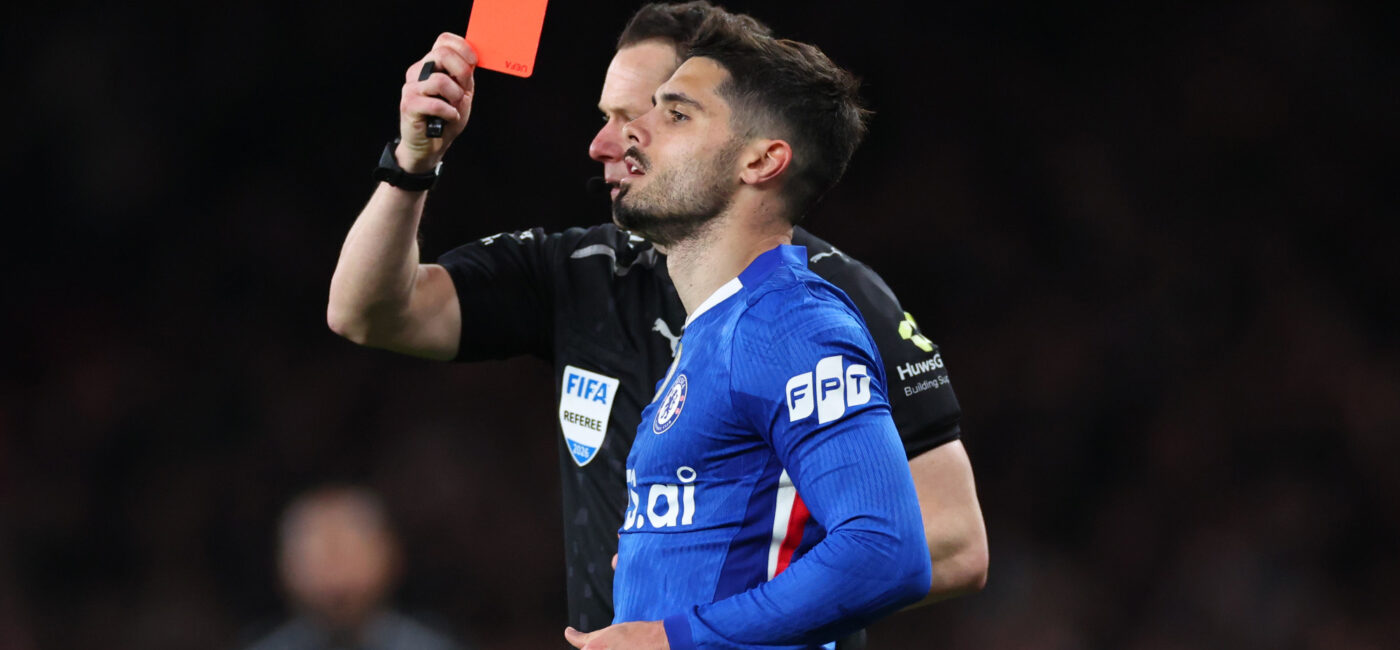 Chelsea manager Liam Rosenior looking frustrated on the touchline during the match against Arsenal.