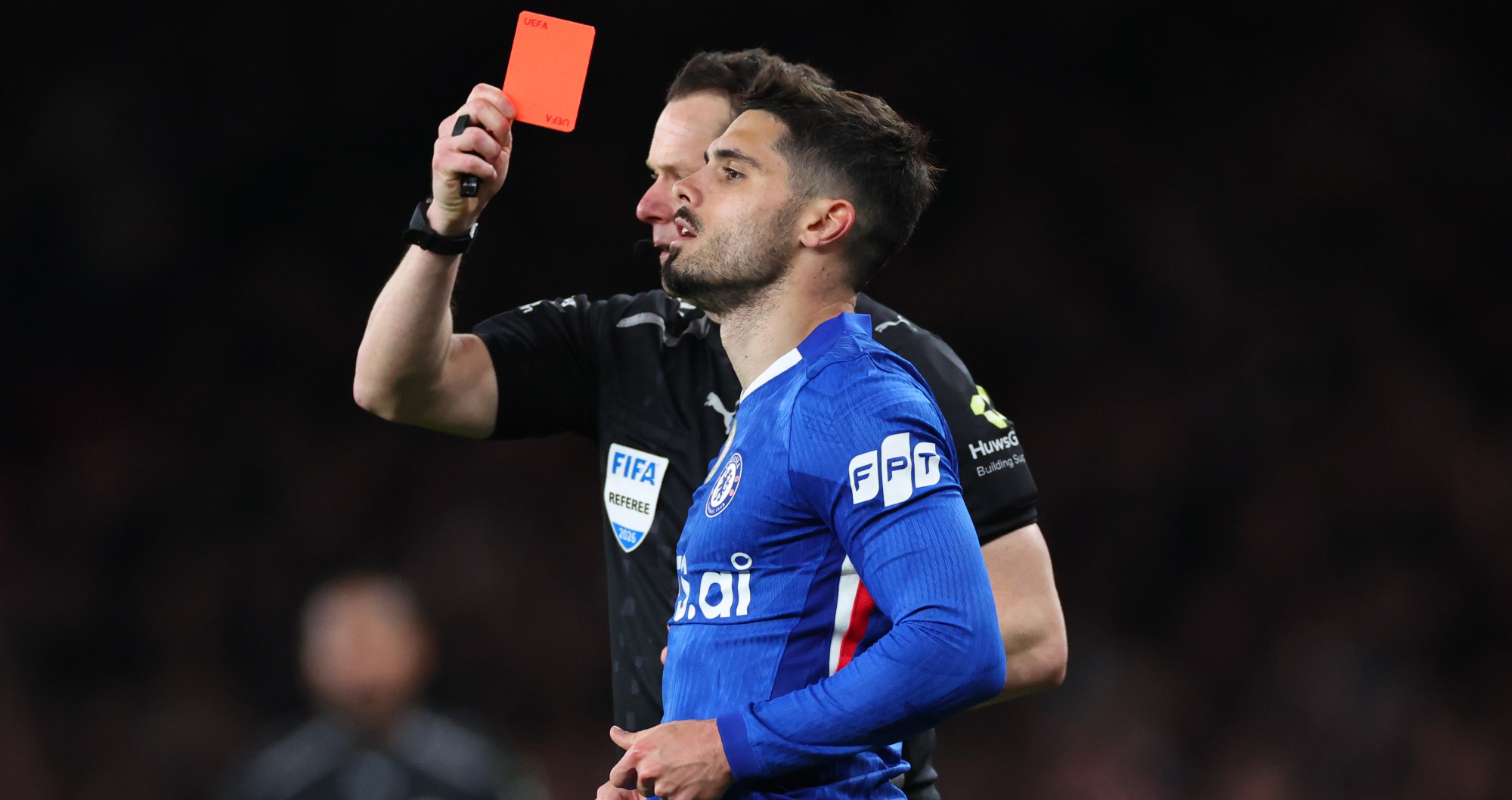 Chelsea manager Liam Rosenior looking frustrated on the touchline during the match against Arsenal.