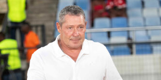 Simba SC players celebrating a disallowed goal during the Kariakoo Derby against Yanga in Zanzibar.
