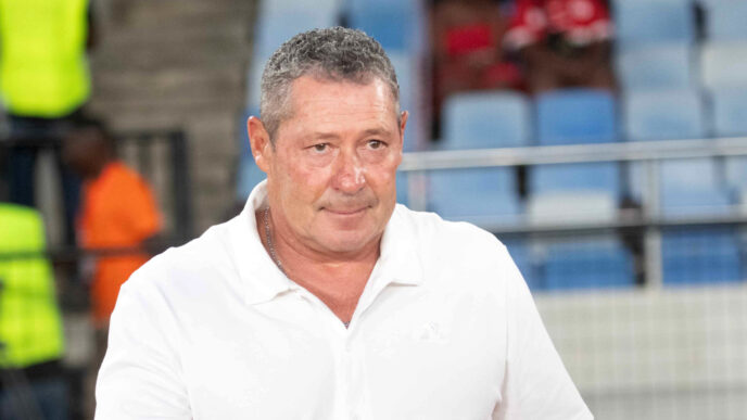 Simba SC players celebrating a disallowed goal during the Kariakoo Derby against Yanga in Zanzibar.