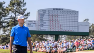 Ludvig Åberg lining up a putt during the third round of the 2026 Masters.