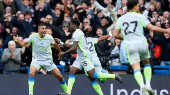 Manchester City celebrating goal against Chelsea in Premier League match